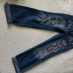 Distressed Blue Jeans with Red Accents